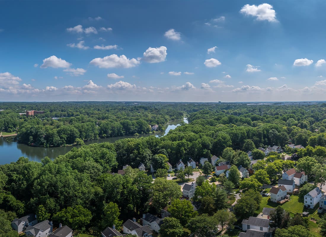 Parkton, MD - Aerial Panorama of Single Family Homes and Town House Neighborhoods Around Lake Elkhorn